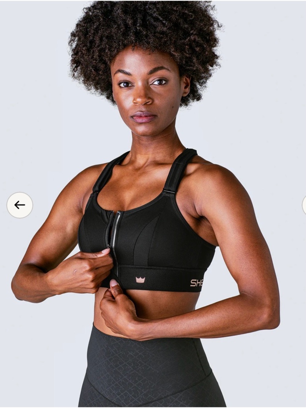 SHEFIT Black Activewear Adjustable Sports Bra with Gold Accent Size 2 Luxe